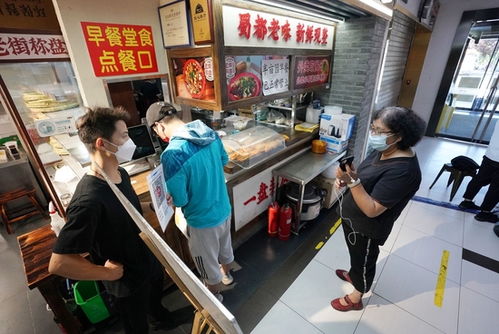 北京发布新版餐饮外卖防疫指引 就餐离桌须戴口罩,外卖人员划片管理
